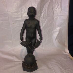 Turtle boy antique cast iron figure if Boy with turtles on top of the world
